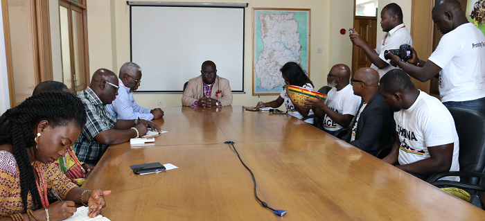  Mr Kenneth Ashigbey (head of table) chatting with members of the foundation and some members of the editorial board